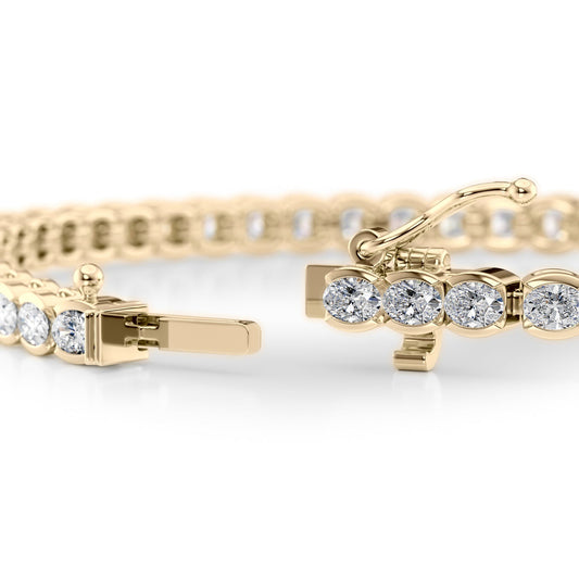East West Half Bezel Oval Tennis Bracelet